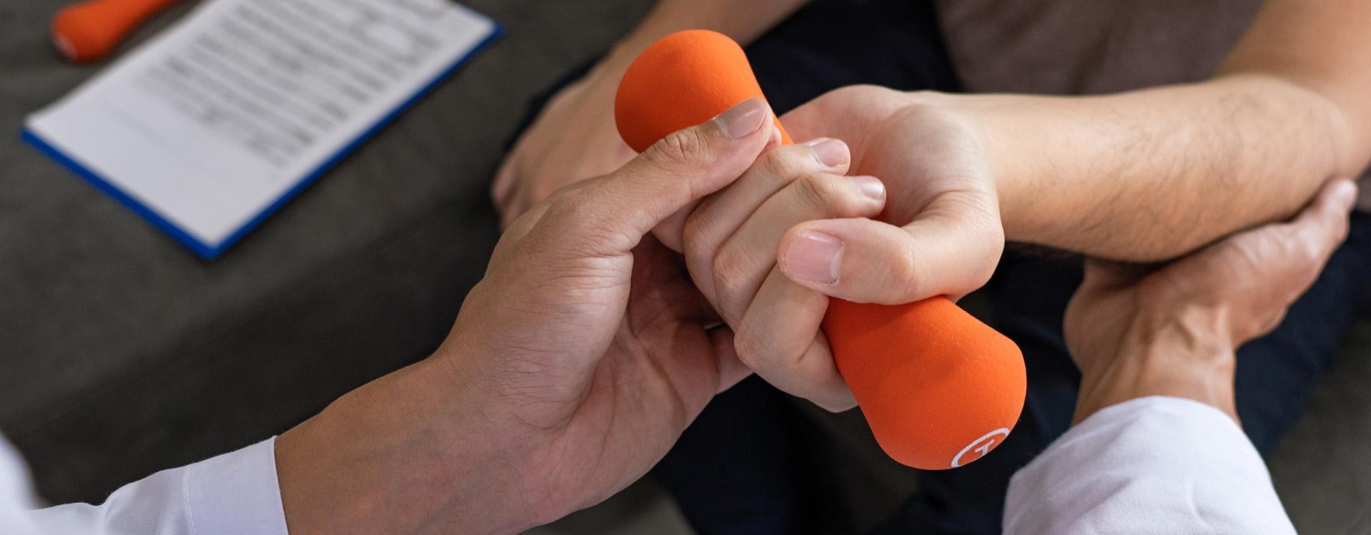 Physical therapist working with patient